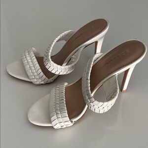 BCBG White Woven Strap High Heel Sandals
Size: 8.5, Heel: 4-1/2”